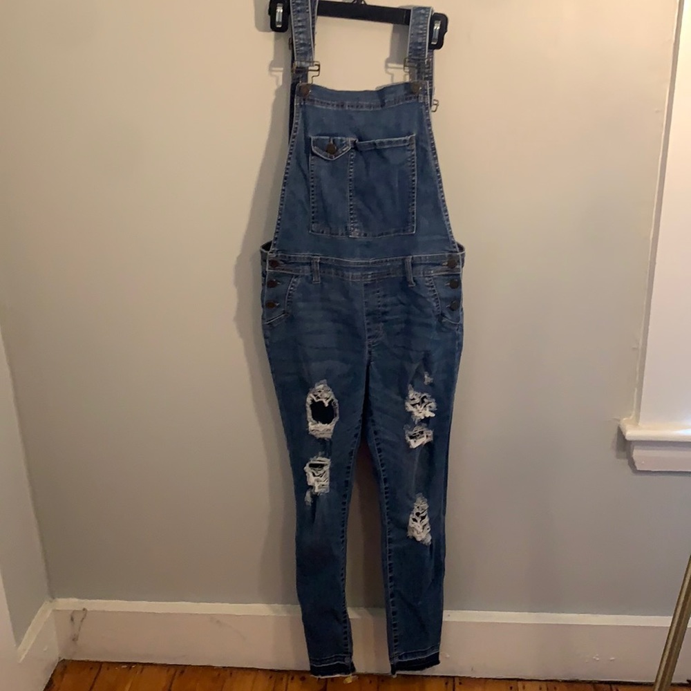 Stretch distressed overalls